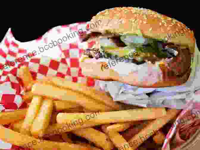 A Close Up Shot Of A Tantalizing Chicago Cheeseburger With Fries. Iconic Chicago Dishes Drinks And Desserts