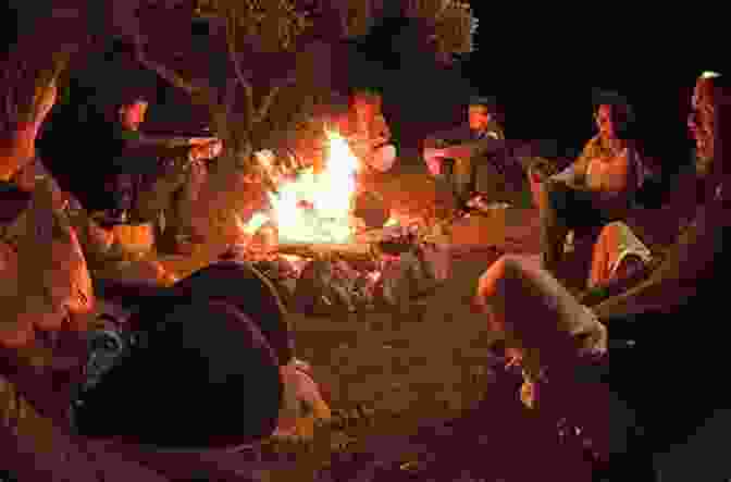 A Group Of People Sitting Around A Campfire, Sharing Stories And Laughter Under The Starry Night Sky. Victoria Bitter Stories From An Australian Winter