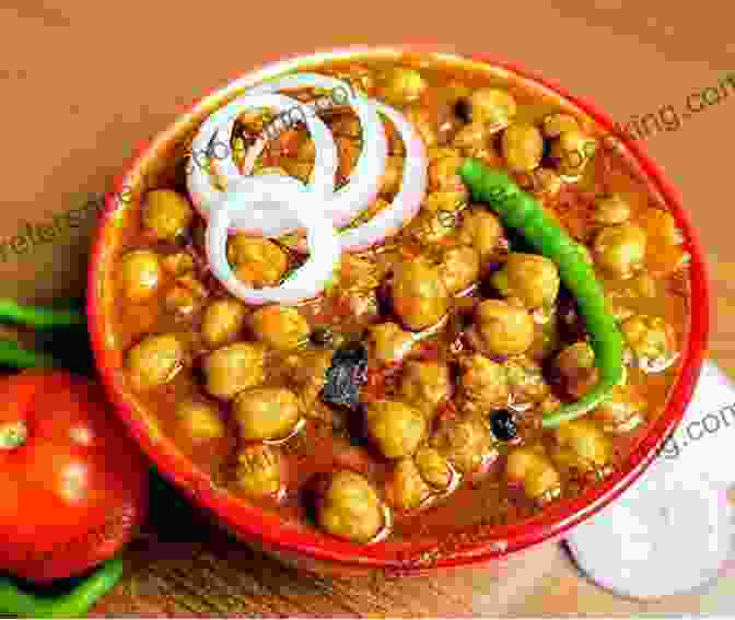A Plate Of Chole Bhature, A Punjabi Dish Consisting Of Chickpeas In A Spicy Gravy And Fried Bread Mumbai Modern: Vegetarian Recipes Inspired By Indian Roots And California Cuisine