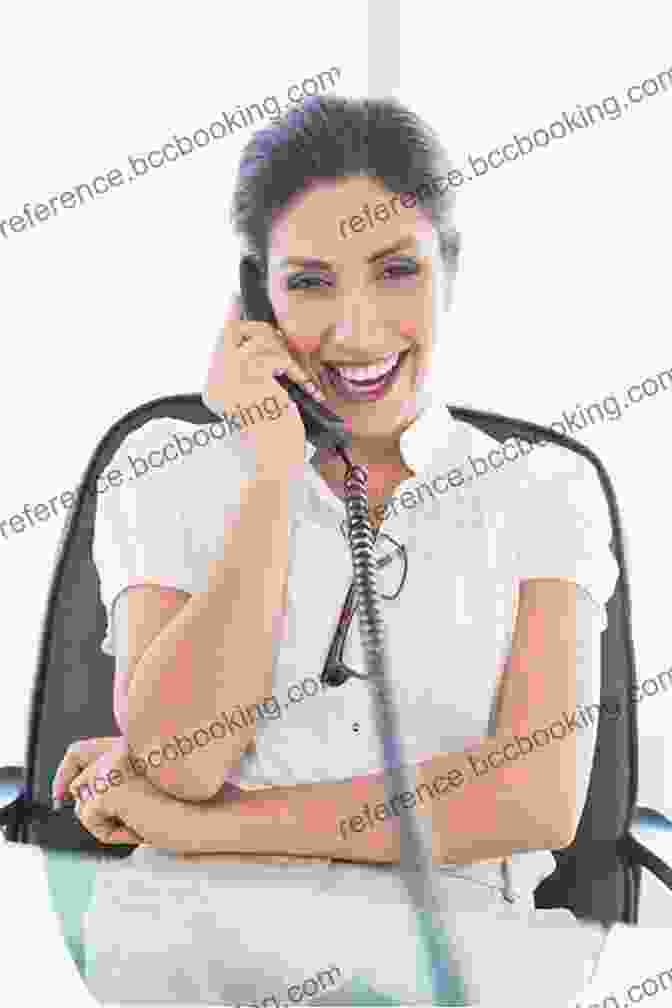 A Secretary Laughing At Her Desk Office Life: The Lighter Side Of Your Secretarial Career