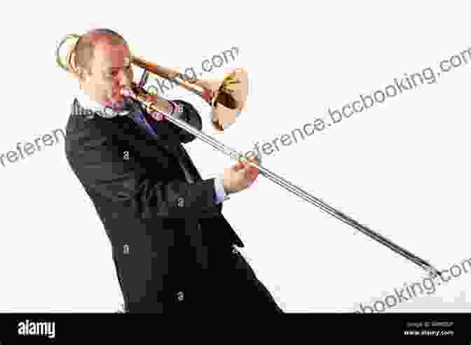 A Young Man Playing The Trombone On Stage It All Started With A Trombone
