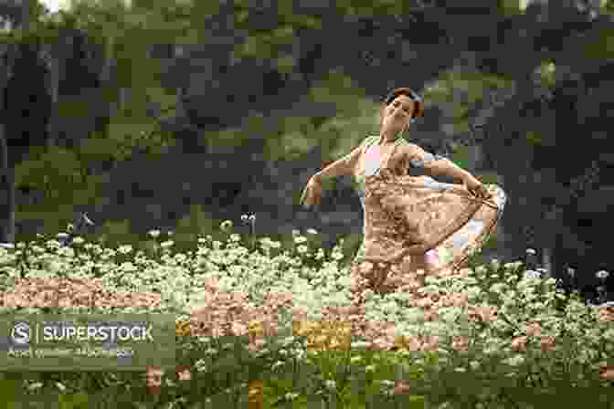 A Young Woman Dancing In A Field Of Wildflowers Dancing Upon Barren Land Alexis Dubief