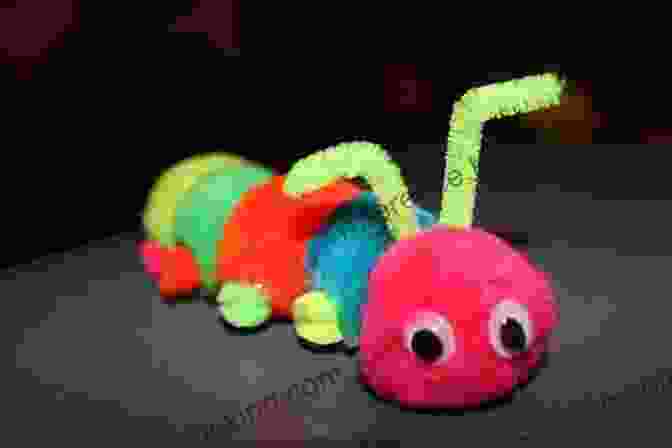 Egg Carton Caterpillars With Colorful Bodies And Pipe Cleaner Antennae, Crawling Along A Tabletop 35 Summer Crafts For Kids + 2 Free
