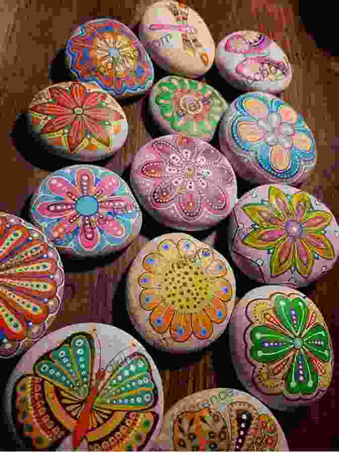 Painted Rocks Arranged On A Table, Featuring Colorful Designs, Animal Motifs, And Inspiring Messages 35 Summer Crafts For Kids + 2 Free